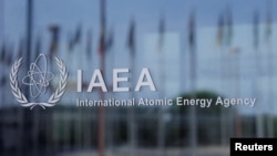 (FILE) The logo of the International Atomic Energy Agency (IAEA) is seen at their headquarters in Vienna, Austria April 11, 2024.