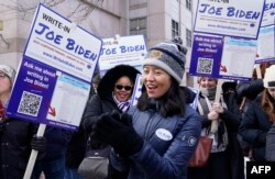 FILE - Boston Mayor Michelle Wu joins supporters demonstrating at a Joe Biden Write-In Rally in Manchester, New Hampshire, on January 20, 2024.