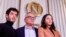 The husband and children of this year's winner of the Nobel Peace Prize, Ali, Taghi and Kiana Rahmani, attend a press conference at the Nobel Institute in Oslo, Norway, on Dec. 9, 2023. Their wife and mother, Narges Mohammadi, is jailed in Iran.