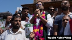 Peoples Democratic Party candidate Zuhaib Yousuf addressing the public gathering at Lal chowk during a rally, Srinagar, Sept. 10, 2024.