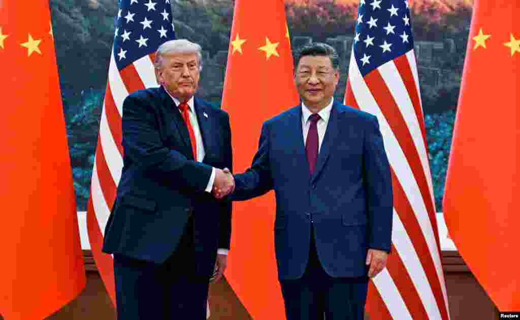 FILE PHOTO: FILE PHOTO: U.S. President Donald Trump visits China