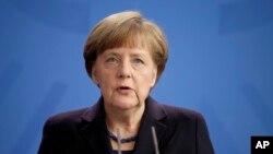 FILE - German Chancellor Angela Merkel, March 24, 2015.