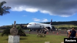 FILE - A LATAM Chile Boeing 787-9 Dreamliner is seen after landing at Mataveri Airport, in Hanga Roa village, Easter Island, Chile.