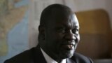 FILE - South Sudan rebel leader Riek Machar speaks in an interview with The Associated Press in Johannesburg, South Africa, Oct. 20, 2016.