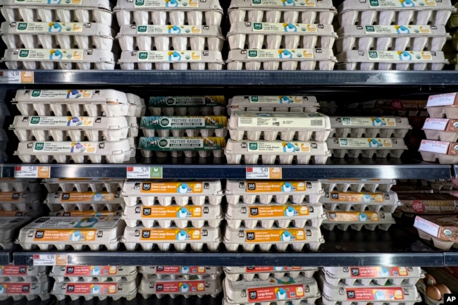 Various grades of eggs are displayed for sale at a Whole Foods grocery store, Friday, Jan. 19, 2024, in New York. (AP Photo/Peter K. Afriyie)