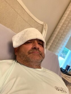 Carlos Gavidia with cold packs on his head (Credit: Carlos Gavidia)