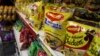 FILE - Packaged food with "Maggi" sign on it are displayed at a grocery store in Bangalore, India, June 5, 2015. 