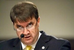 FILE - Then-Veterans Affairs Secretary nominee Robert Wilkie testifies during a hearing on Capitol Hill in Washington, June 27, 2018.