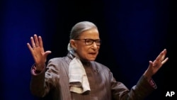 FILE - U.S. Supreme Court Justice Ruth Bader Ginsburg speaks at the University of California at Berkeley, in Berkeley, California, Oct. 21, 2019.