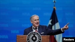 FILE - Texas Governor Greg Abbott speaks in Dallas, Texas, May 4, 2018. 