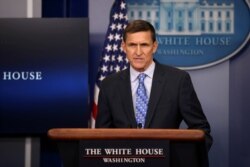 FILE - Then-National security adviser General Michael Flynn delivers a statement at the White House in Washington, Feb. 1, 2017.