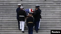 The casket of civil rights icon and longtime U.S. Congressman John Lewis, who died July 17, is carried up the East Front Steps of the U.S. Capitol prior to lying in state inside the Rotunda, in Washington, July 27, 2020.