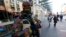 FILE - Belgian soldiers patrol in central Brussels as police search area during a continued high level of security following the recent deadly Paris attacks, Belgium, Nov. 23, 2015. 