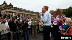 Labour party MP Jim Murphy addresses a crowd during his "100 streets in 100 days" tour to promote the case for Scotland to remain part of the United Kingdom, in Edinburgh, Scotland, Sept. 2, 2014. 