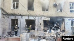 Rescuers work at a Sumy, Ukraine, hospital hit by a Russian drone, Sept. 28, 2024. (State Emergency Service of Ukraine via Reuters)