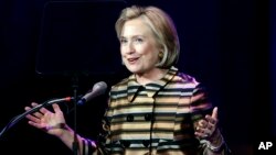 Former Secretary of State Hillary Rodham Clinton speaks during a performance where she was honored at the 40th anniversary celebration of the Children's Defense Fund at the John F. Kennedy Center for the Performing Arts, Sep. 30, 2013 in Washington. 