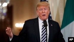 President Donald Trump speaks during a news conference with Italian Prime Minister Giuseppe Conte in the East Room of the White House, July 30, 2018, in Washington. 