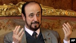 FILE - Rifaat Assad, an exiled uncle of Syrian President Bashar Assad, speaks during an interview in Paris, France, Nov. 15, 2011.