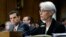 Undersecretary of State for Political Affairs Wendy Sherman (R) accompanied by Treasury Undersecretary For Terrorism And Financial Intelligence David Cohen, testifies on Capitol Hill in Washington, July 29, 2014.