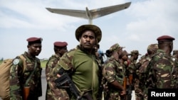 FILE - Members of the Kenya Defence Forces, part of the East Africa Community Regional Force troops, withdraw their deployment as part of a regional military operation targeting rebels, after the DRC did not renew its mandate to fight M23 rebels, in Goma, December 3, 2023.