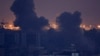 Smoke billows over Beirut's southern suburbs after a strike, amid ongoing hostilities between Hezbollah and Israeli forces, as seen from Sin El Fil, Lebanon, Oct. 9, 2024.