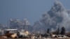 Smoke rises from an explosion in Gaza, as seen from Israel on Aug. 23, 2024.