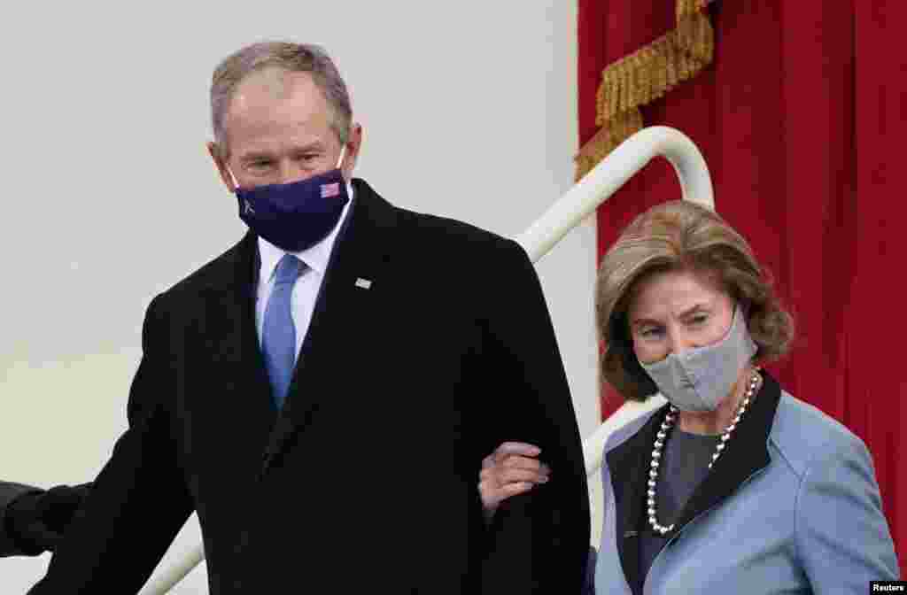 Former U.S. President George W. Bush and his wife Laura Bush arrive for the inauguration of Joe Biden as the 46th President of the United States on the West Front of the U.S. Capitol in Washington.