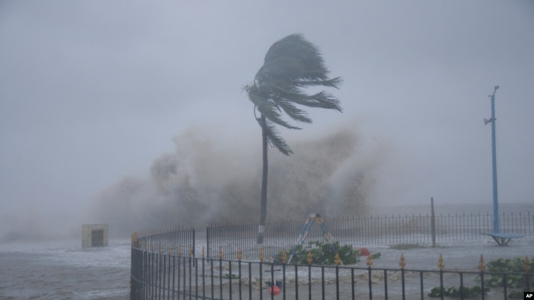 FILE - Waves hit the Bay of Bengal coast as Cyclone Yaas intensifies in West Bengal state, India, May 26, 2021. India is bracing for a powerful cyclone that is likely to hit portions of the western state of Gujarat on Thursday.