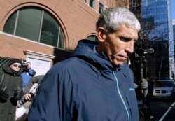 FILE - William "Rick" Singer founder of the Edge College & Career Network, departs federal court in Boston on March 12, 2019, after he pleaded guilty to charges in a nationwide college admissions bribery scandal.