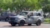 Un vehículo dañado se encuentra en el lugar de una colisión mortal cerca de una parada de autobús en Brownsville, Texas, el domingo 7 de mayo de 2023.