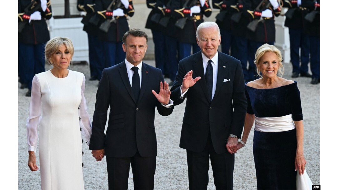 French first lady Brigitte Macron, French President Emmanuel Macron, U.S. President Joe Biden and U.S. first lady Jill Biden pose ahead of an official state dinner as part of Biden's state visit to France, at the Presidential Elysee Palace in Paris on June 8, 2024.