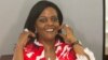 FILE: Zimbabwean first lady Grace Mugabe reacts as her picture is taken during a voter registration exercise at State House in Harare, Thursday, Sept. 14, 2017. (AP Photo/Tsvangirayi Mukwazhi)