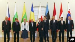 Participants in the meeting of heads of state of NATO countries in central and eastern Europe in Warsaw, Poland, Jul 22, 2014.