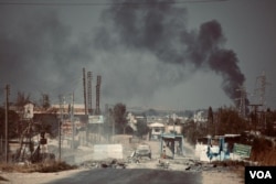 FILE - A checkpoint, abandoned by Syrian Democratic Forces after Turkish military operations began, pictured on Oct. 11, 2019, outside Ras al-Ayn, Syria. (A. Lourie/VOA)