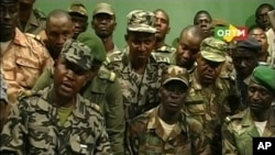 Renegade Malian soldiers appear on television at the ORTM television studio in Bamako in this March 22, 2012. THIS IMAGE HAS BEEN SUPPLIED BY A THIRD PARTY. IT IS DISTRIBUTED, EXACTLY AS RECEIVED BY REUTERS. 