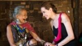 United Nations High Commissioner for Refugees (UNHCR) Special Envoy, Angelina Jolie (R), meets ethnic Karenni refugee Baw Meh, age 75, and her family from Myanmar, also known as Burma, at the Ban Mai Nai Soi refugee camp near the border with Thailand.