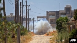 FILE - A landmine is exploded during Turkish demining operations in an area south of Tripoli, Libya, June 15, 2020. The U.S. military has accused mercenaries of the Russian state-backed Wagner group of laying landmines and other explosive devices in Libya.