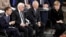 France's President Macron, German President Steinmeier, Wolfgang Schaeuble, President of the German Federal Parliament, and German Chancellor Merkel attend a meeting of the Bundestag in Berlin, Nov. 18, 2018, Germany's national day of mourning.
