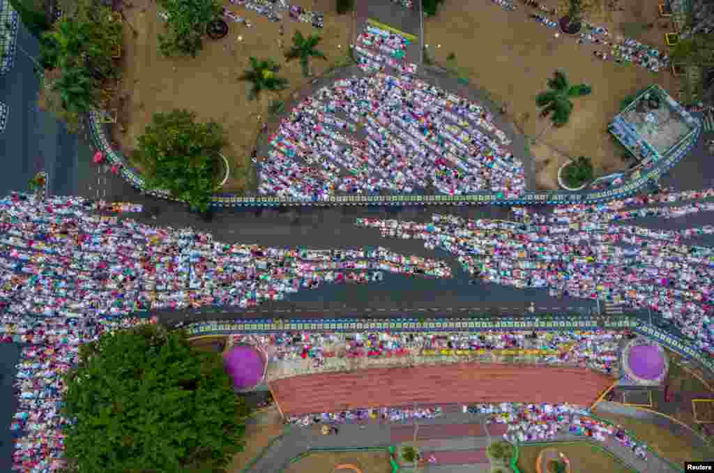 Indonesian Muslims offer Eid al-Adha prayers in Ciamis, West Java province in this photo taken by Antara Foto.
