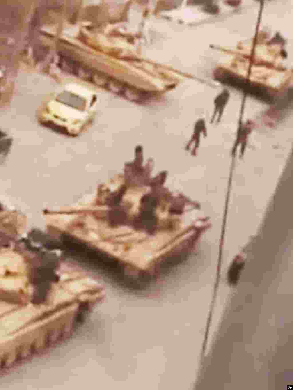 This image made from amateur video purports to show Syrian military tanks in Damascus, Syria, March 27, 2012. (AP/Shaam)