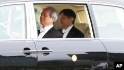 Japan's new Emperor Naruhito leaves the Imperial Palace, May 1, 2019, in Tokyo. 