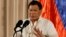 Philippine President Rodrigo Duterte gestures during the 19th Founding Anniversary of the Volunteers Against Crime and Corruption at the Malacanang Presidential Palace in Manila, Philippines, Aug, 16, 2017.
