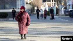 People walk in Tiraspol in Moldova's breakaway region of Transdniestria, Jan. 4, 2025. Flows of Russian gas via Ukraine to central and eastern Europe stopped on New Year's Day after a transit deal expired between the warring countries and Kyiv refused to extend it.