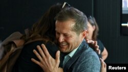 Scientist Ferenc Krausz celebrates winning the 2023 Nobel Prize in Physics together with Pierre Agostini and Anne L'Huillier, Munich, Germany, Oct. 3, 2023.