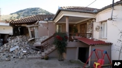 Damage is seen on a house after an earthquake in Damasi village, central Greece, March 3, 2021. The earthquake with a preliminary magnitude of up to 6.3 was felt as far away as the capitals of neighboring Albania, North Macedonia, Kosovo and Montenegro.