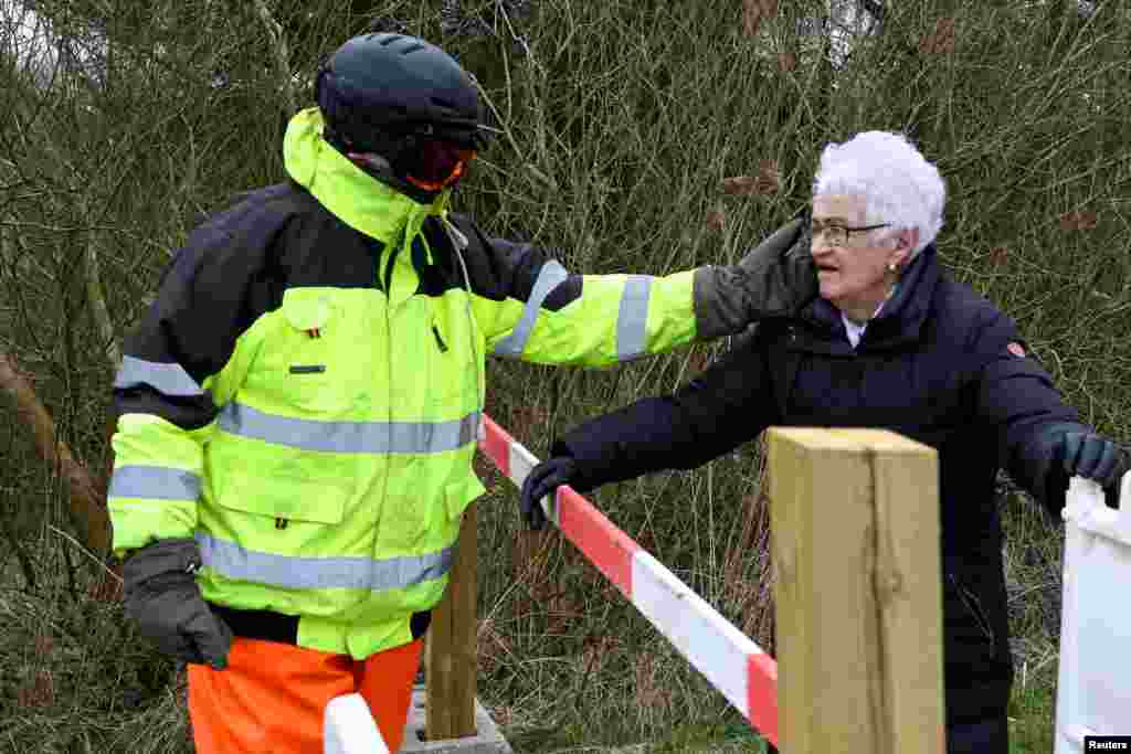 The separated couple, Karsten Tuchsen Hansen, 89, from Suederluegum, Germany and his Danish girlfriend Inga Rasmussen, 85, from Gallehus, meet daily at the Aventoft border crossing after the border was closed, due to the spread of the coronavirus.