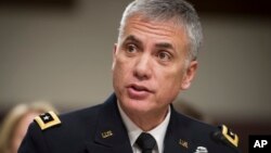 Army Lieutenant General Paul Nakasone appears before the Senate Armed Services Committee to discuss his qualifications as nominee to lead the National Security Agency and U.S. Cyber Command, during a hearing on Capitol Hill in Washington, March 1, 2018.