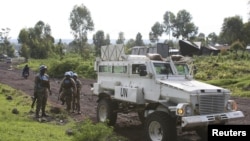 FILE - U.N. peacekeepers patrol the streets of Goma, Democratic Republic of Congo, Dec. 2, 2015.