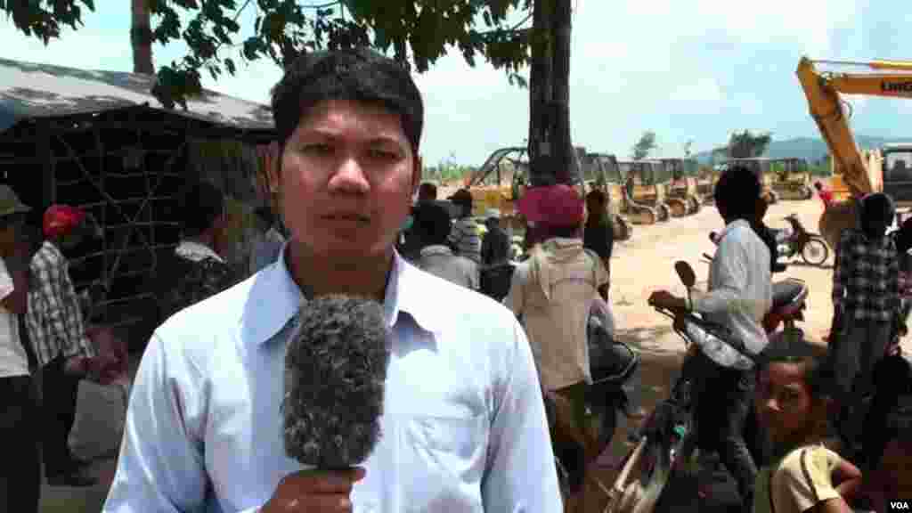 Reporter Mony Say at a land eviction dispute.