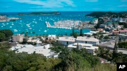 FILE - This May 9, 2018, photo shows a general view of the bay of Noumea, the capital of New Caledonia, with the yachting port in the background. New Caledonia, a French archipelago in the South Pacific, is preparing for an independence referendum on Nov. 4, 2018, the last step in a three-decade decolonization effort. 